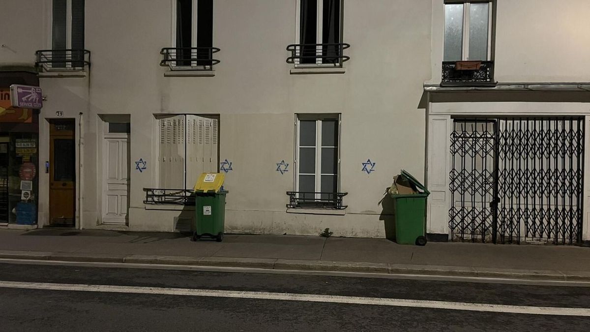 Stars of David adorn the facades of buildings in Paris and its suburbs