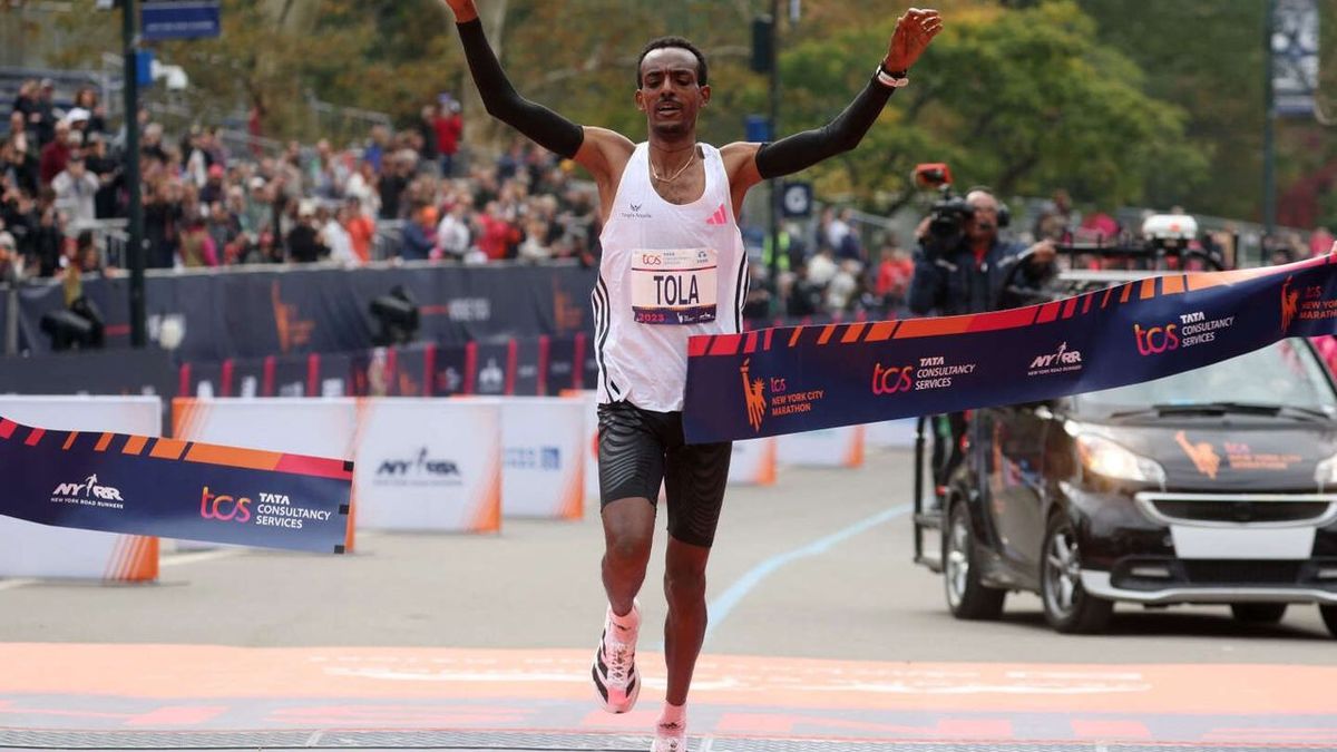 Tamirat Tola of Ethiopia runs under 2 hours 5 minutes, capping a season full of impressive records